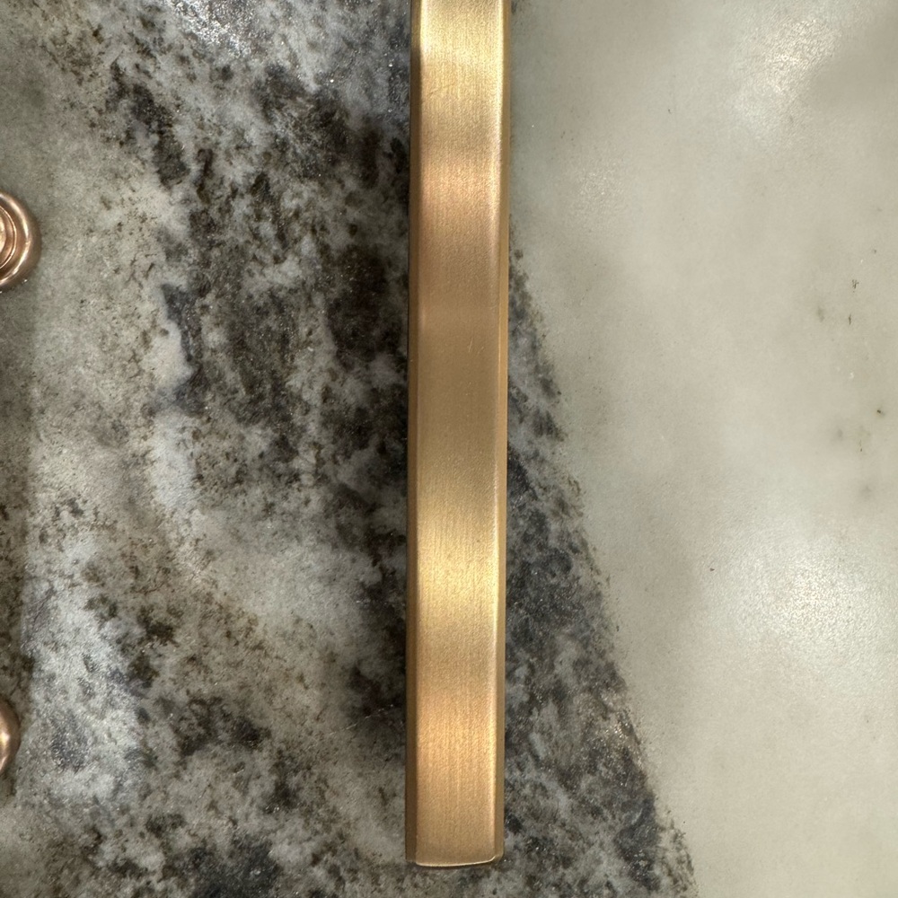 Brushed brass cabinet pull